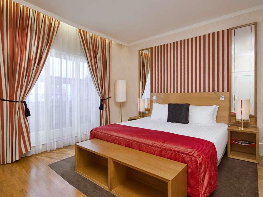 Mamaison Hotel Riverside Prague Room photo A bedroom at the hotel